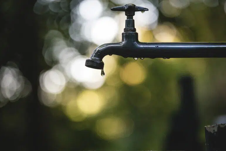 Faucet dripping water like vaginal discharge